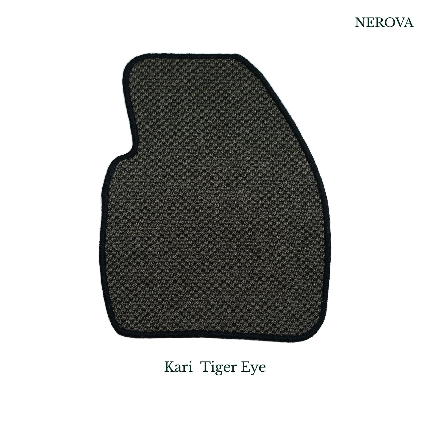 Nerova Kari Tiger Eye sisal mat in BMW X3 driver footwell — dark charcoal natural sisal with black rubber heel pad, luxury car mat