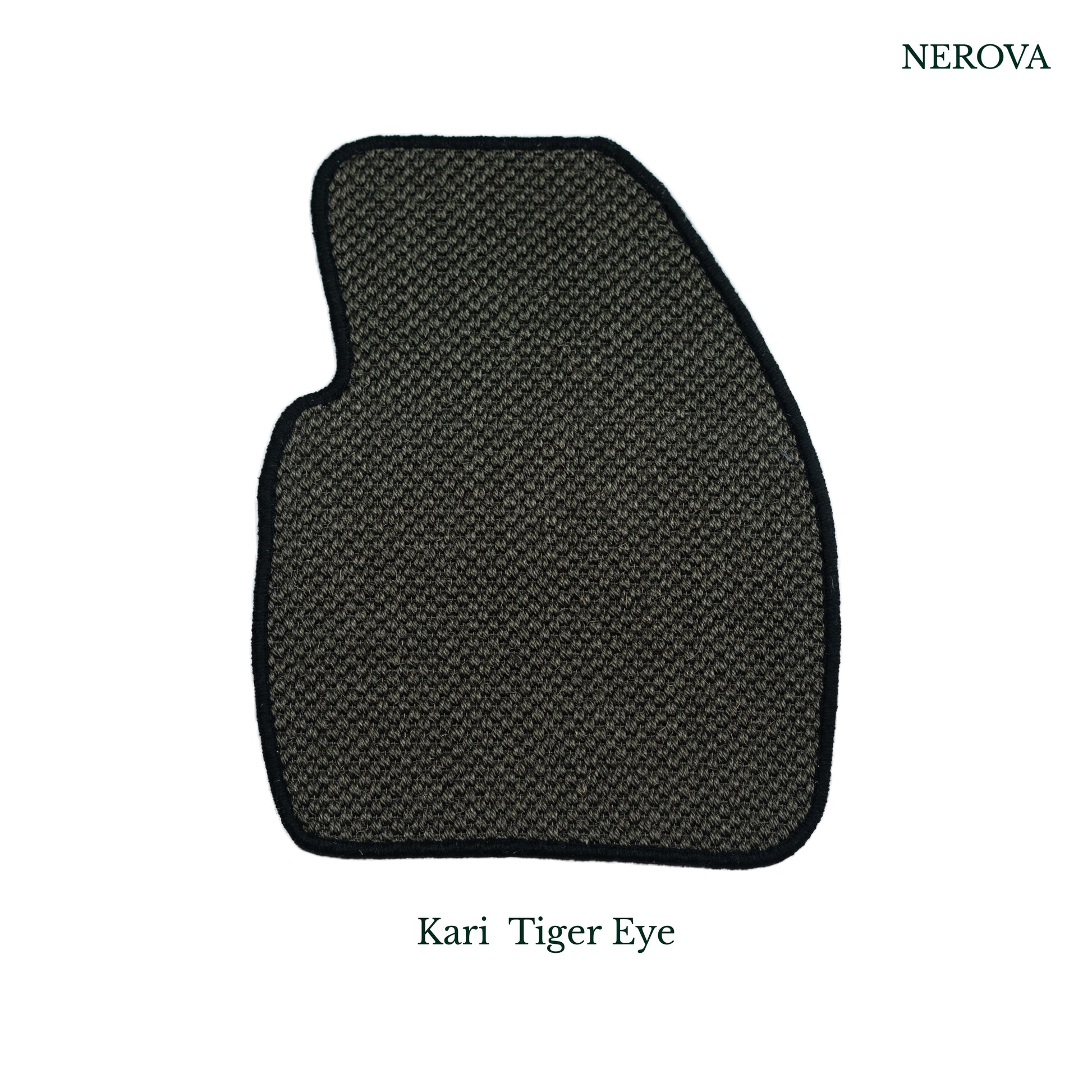 Nerova Kari Tiger Eye sisal mat in BMW X3 driver footwell — dark charcoal natural sisal with black rubber heel pad, luxury car mat