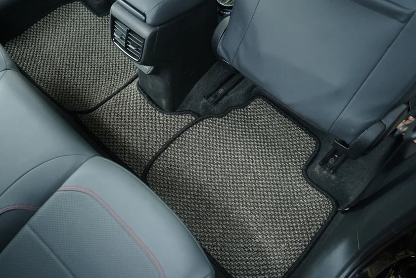 Nerova Apex Kari custom car mat – luxury dark interior close-up